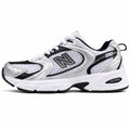 New Balance 530 blanco negro plata vista lateral izquierda