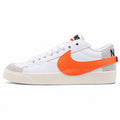 Nike Blazer Low 77 blanco naranja lateral izquierda