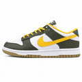 Nike Dunk Low blanco verde amarillo lateral izquierda